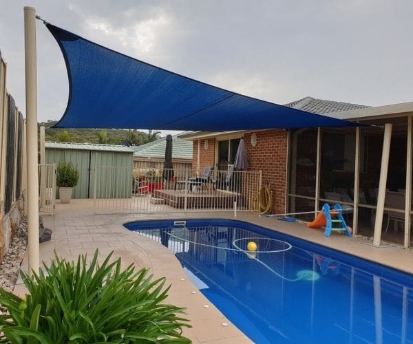Residential shade sail over patio and outdoor living area in Lake Macquarie